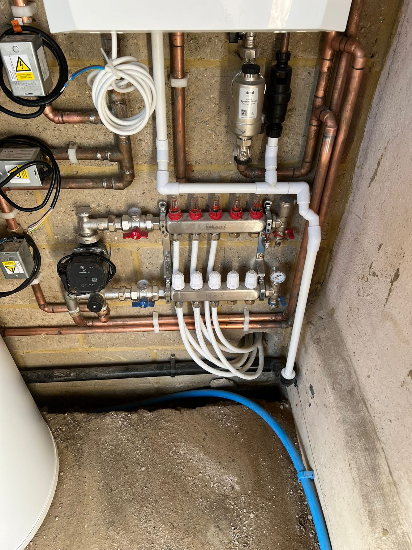 Underfloor heating manifold installation, Essex