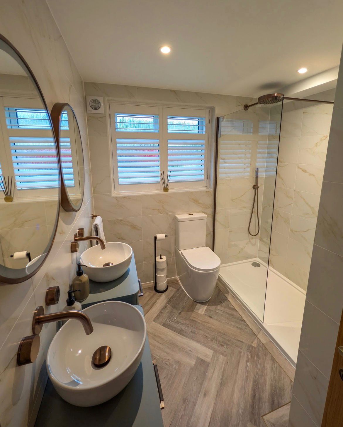 Luxury bathroom renovation with double basin and walk-in shower, Essex